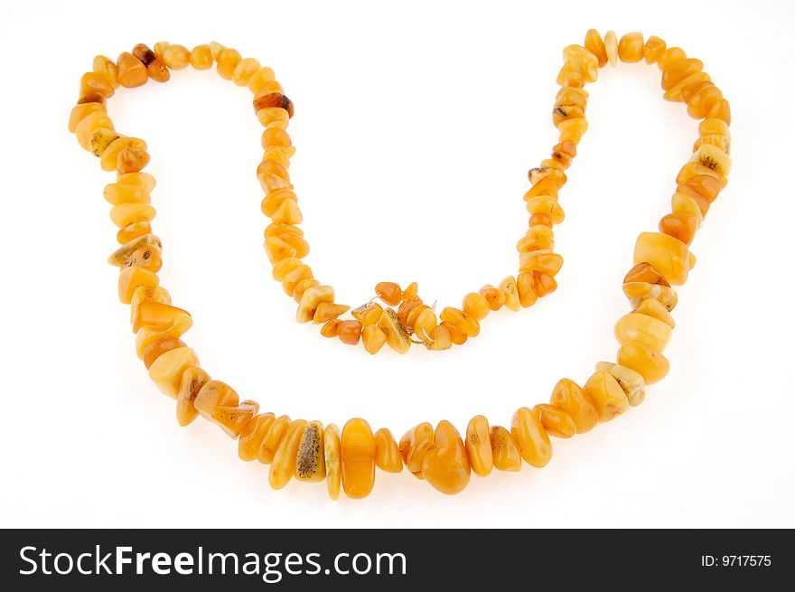 Beads, necklace of amber on white