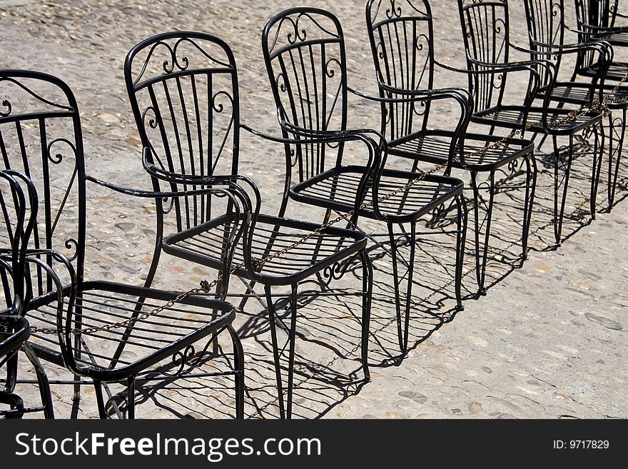 Old chairs on a row