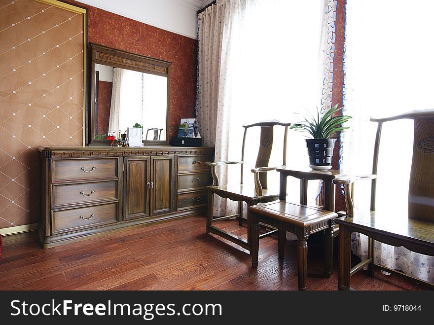 Bedroom seating area in home. Bedroom seating area in home.