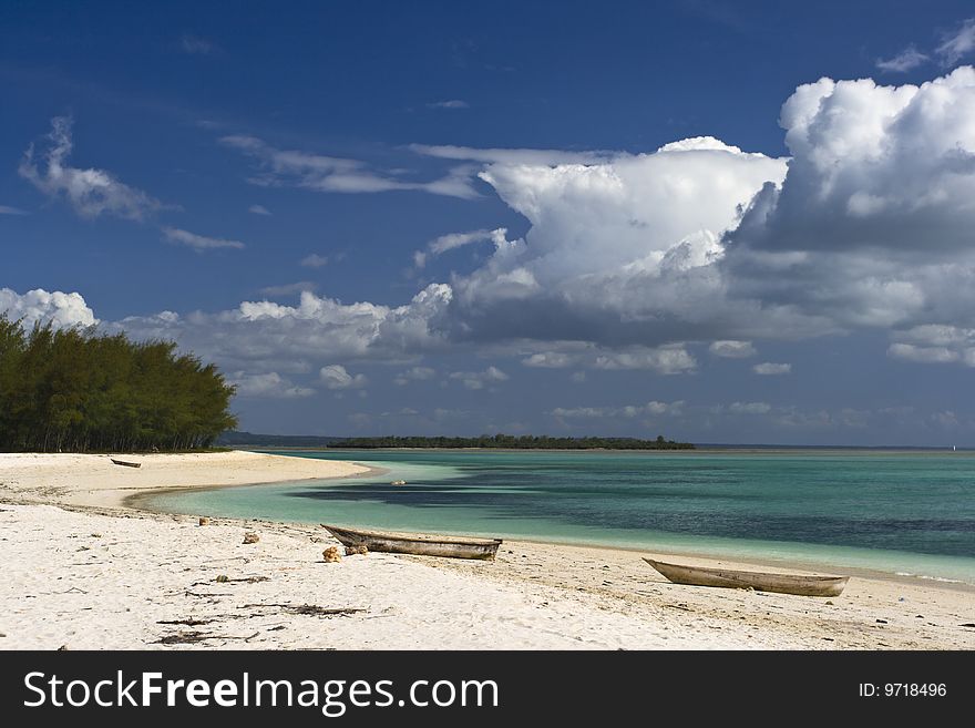 Sand beach with fishing boats and moody sky nearby Kendwa,Zanzibar. Sand beach with fishing boats and moody sky nearby Kendwa,Zanzibar