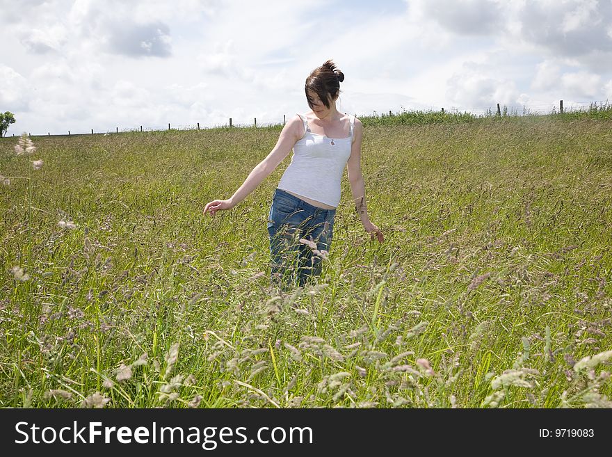 Wonman in the middle of a field