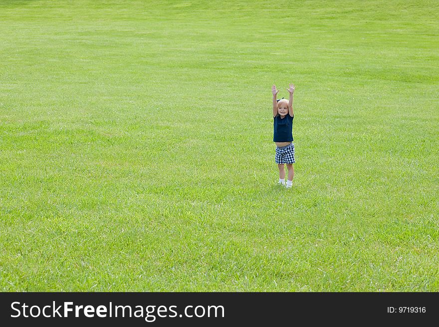 One Girl Standing In Grass