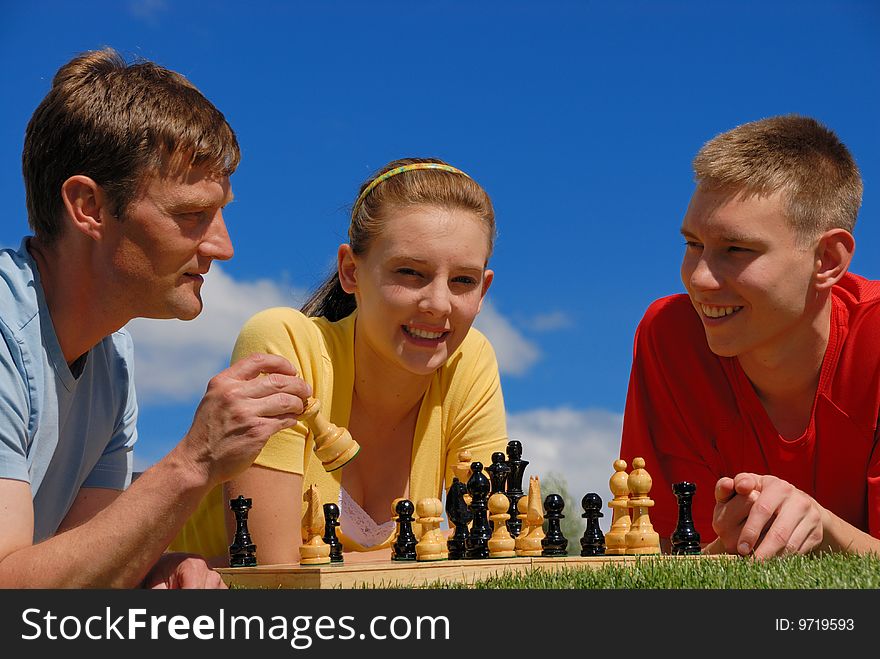 Father Play Chess With Children