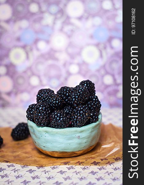 Homemade, sweet, delicious blackberries in a handmade dish