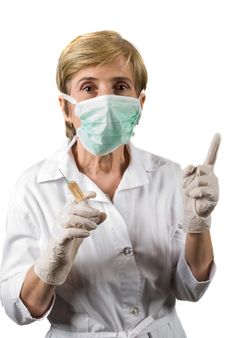 Mature Woman Doctor Pointing Upwards Stock Photos Mature Woman Doctor Pointing Upwards Stock Photos