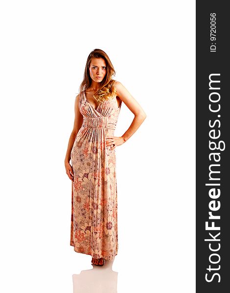 Model poses wearing sundress set against white backdrop with copy space.