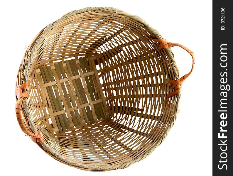 Still life of a rattan basket isolated on white background with clipping path. Still life of a rattan basket isolated on white background with clipping path