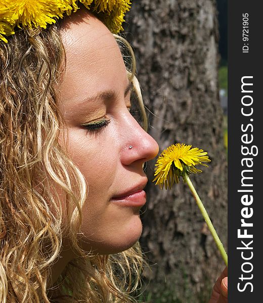 Curly girl smell to dandelion. Curly girl smell to dandelion