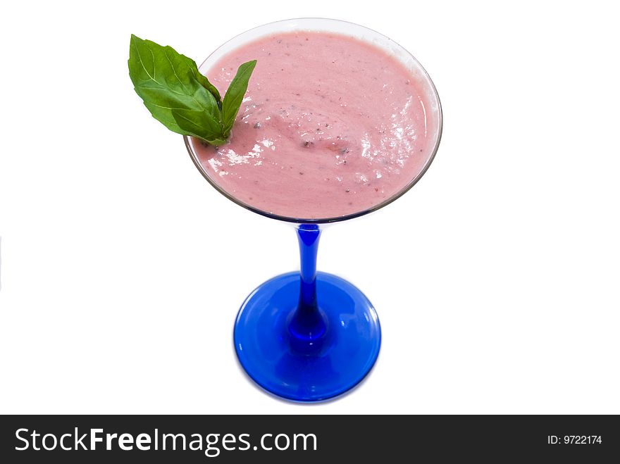 Strawberry milkshake with mint in the glass