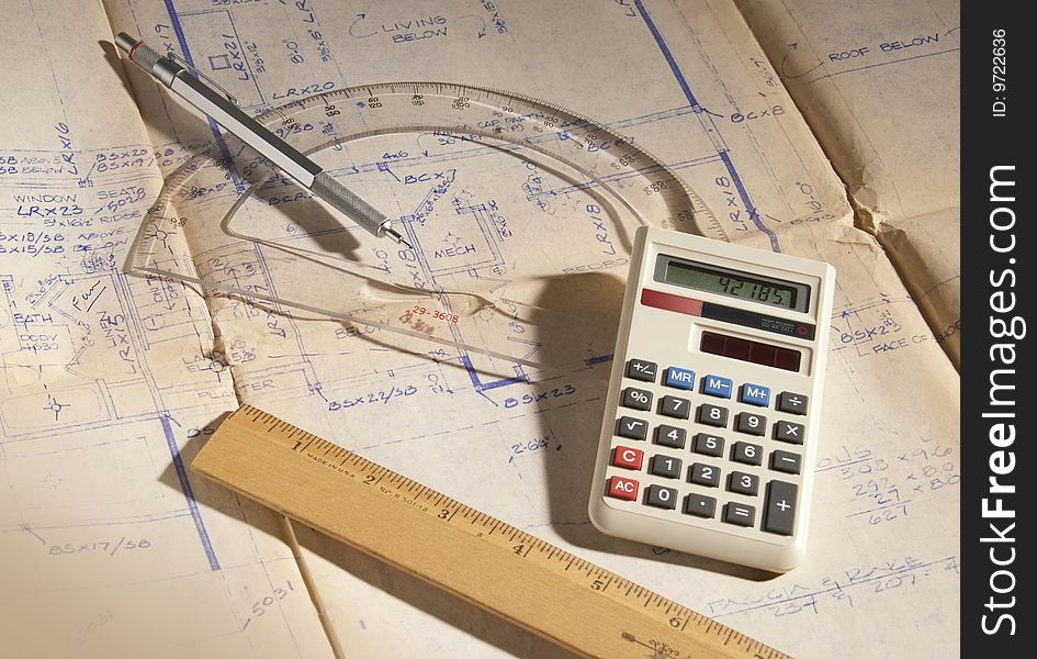 Various tools used by engineers and architects to design plans and blueprints. Various tools used by engineers and architects to design plans and blueprints