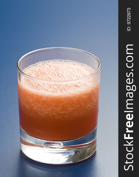 Refreshing cold watermelon juice isolated over white
