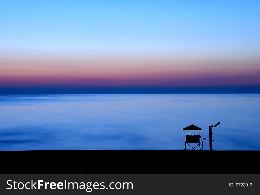 Sunset with clear blue sky and  silhouette watchtower. Sunset with clear blue sky and  silhouette watchtower