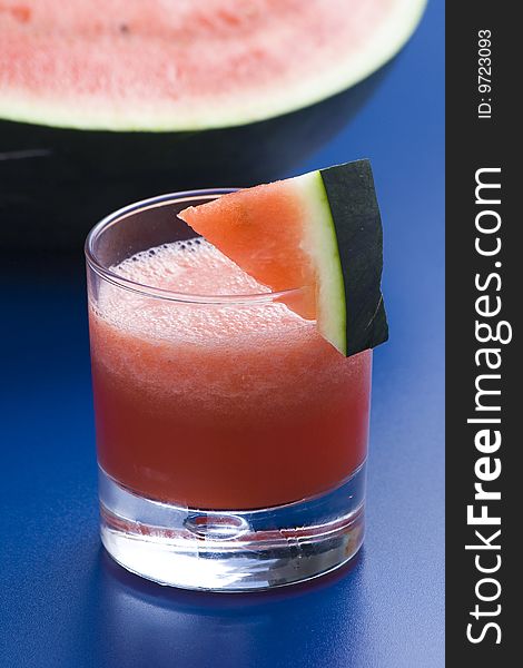 Refreshing cold watermelon juice isolated over white