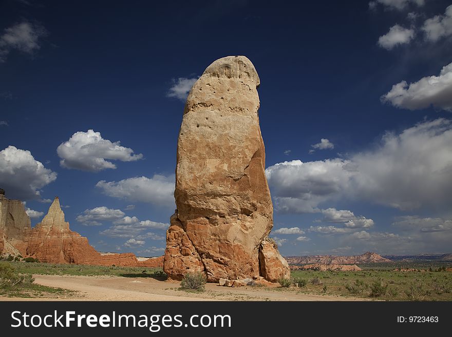 View of the red rock formations in Kodachrome Basin with blue skys and clouds