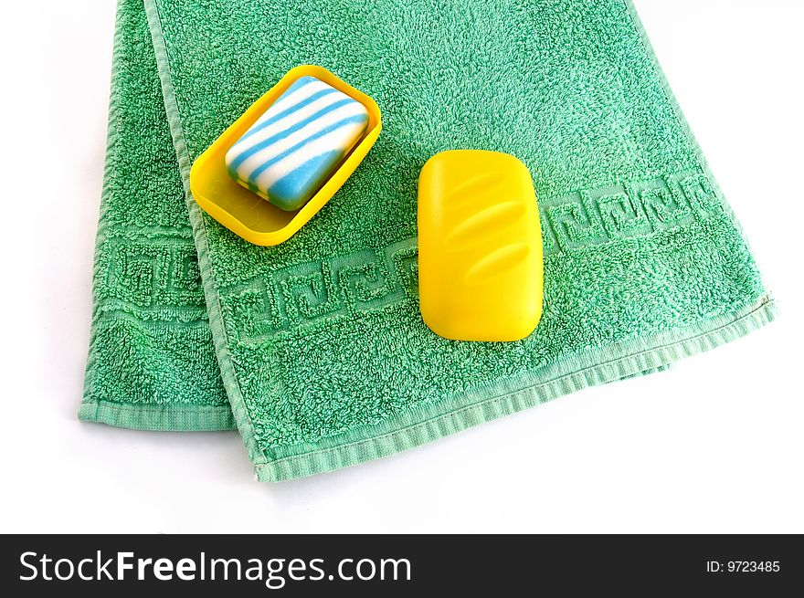 Blue soap on a green towel