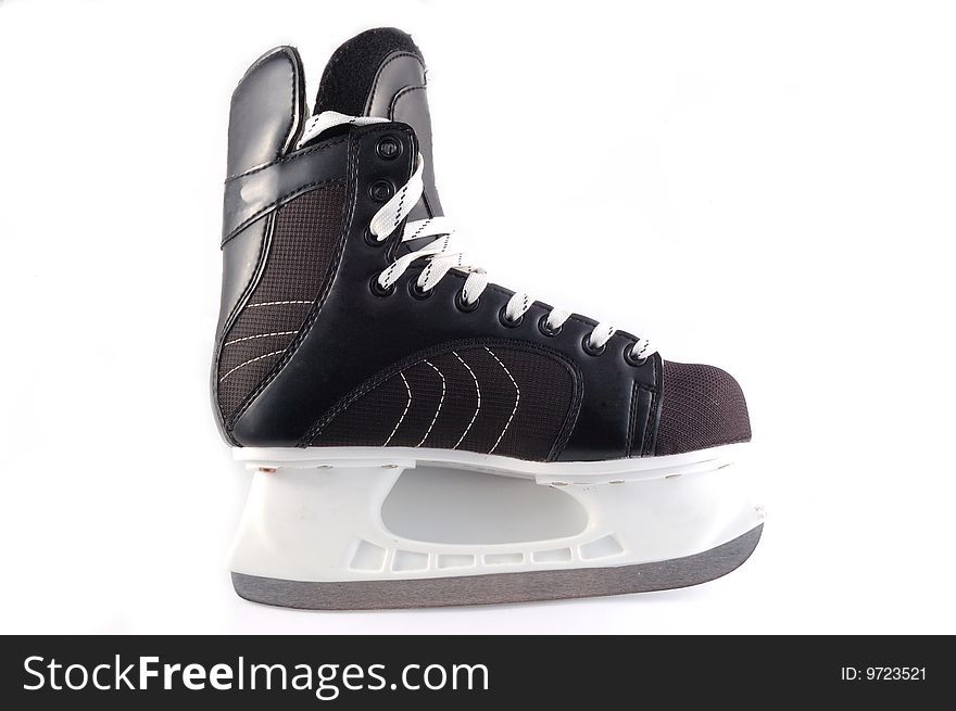 Black hockeys skates on a white background