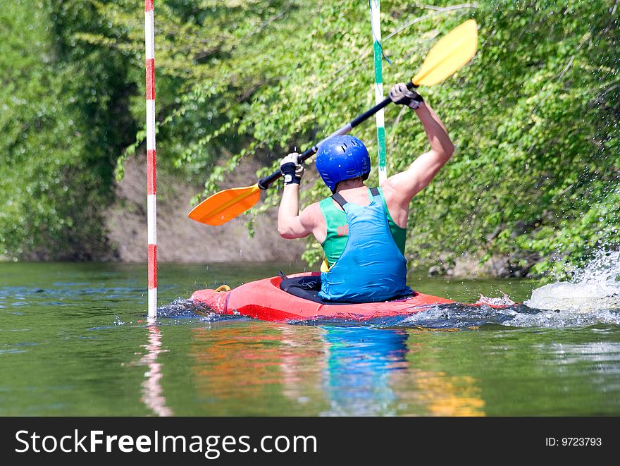 Image of the kayaker with an oar on the water