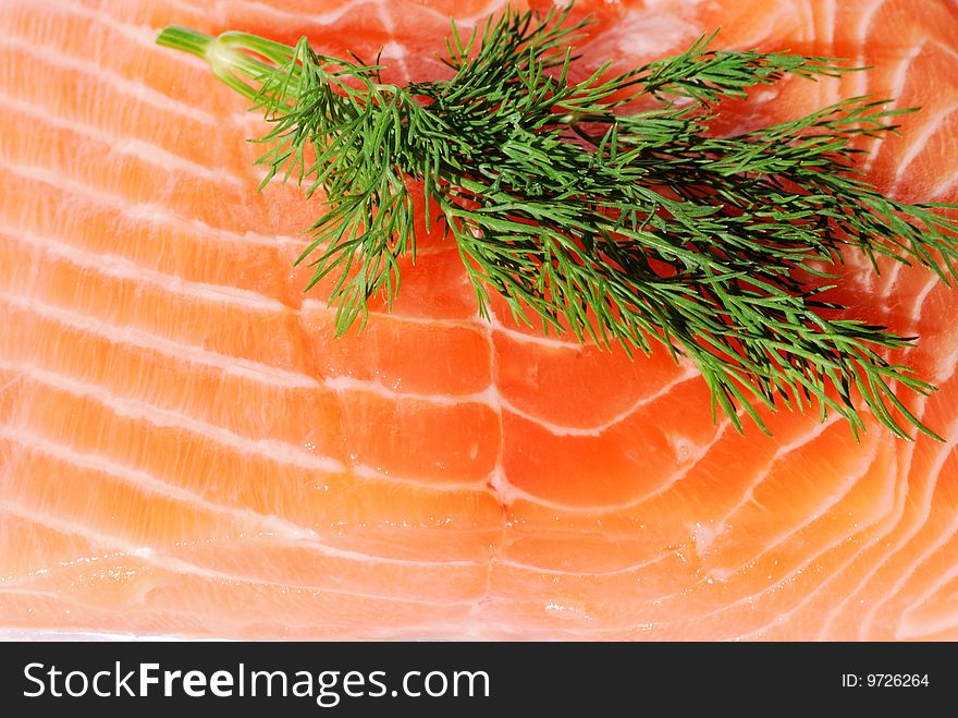 Raw salmon with dill over white