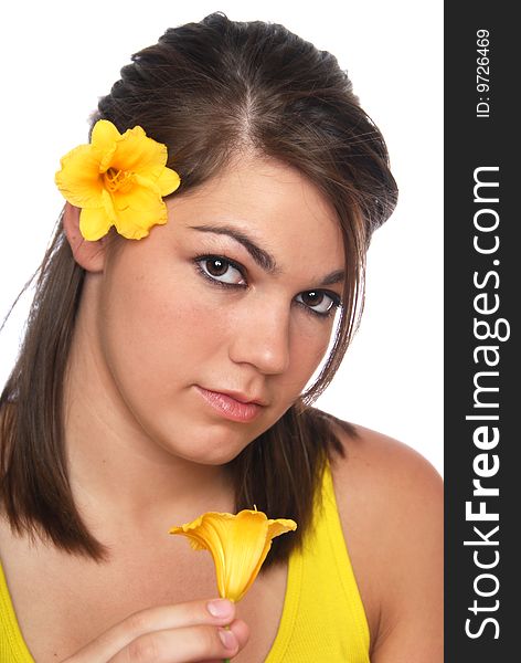 A pretty girl with yellow flowers and yellow top. A pretty girl with yellow flowers and yellow top.