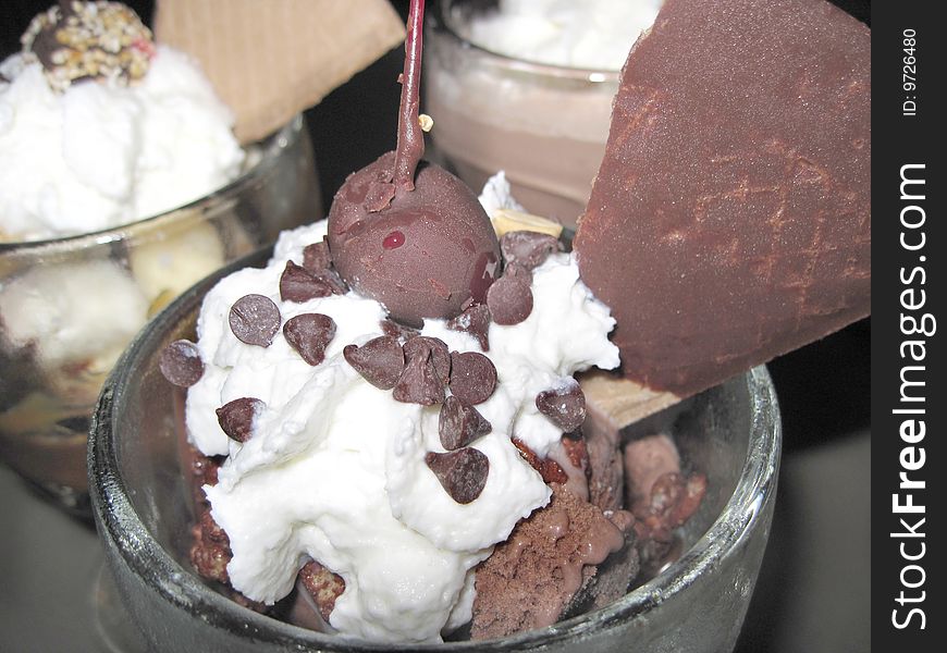 Chocolate Ice-cream (with cherry in focus)