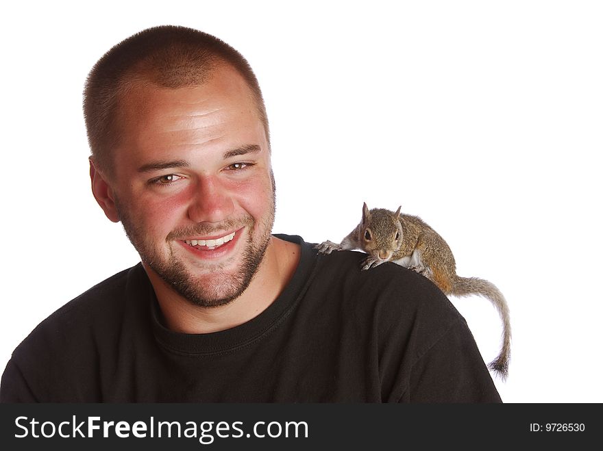 A handsome young man with a pet squirrel on his shoulder. A handsome young man with a pet squirrel on his shoulder.