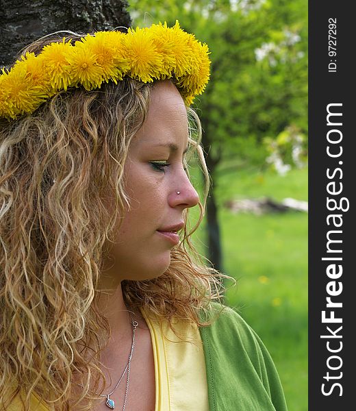 Curly Girl With Dandelion Chain On Head