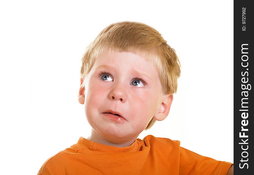 Portrait of the crying boy on a white background. Portrait of the crying boy on a white background