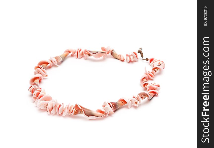 Beads from cockleshells on a white background