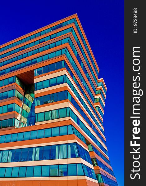 Menzis Office Building, Groningen, Netherlands. Three identical prismatic volumes, each four stories high, are rotated at 90 degrees to one another, so the building seems to lean. Menzis Office Building, Groningen, Netherlands. Three identical prismatic volumes, each four stories high, are rotated at 90 degrees to one another, so the building seems to lean.