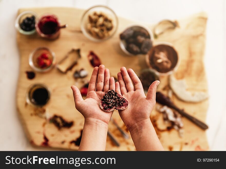 Close Up Of Child Hands Preparing Baking Cookies.