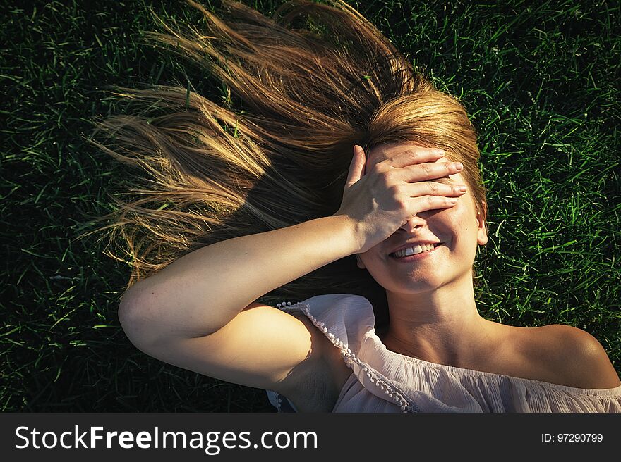 Beautiful woman having fun in the park. Beautiful woman having fun in the park.