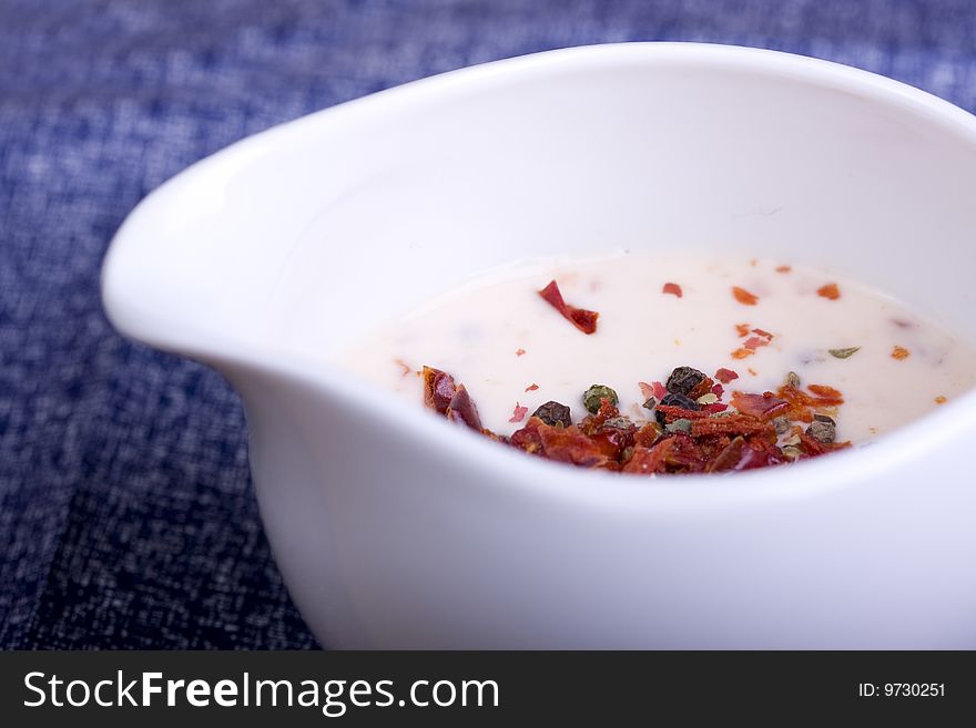 Paprika souce on blue table-cloth