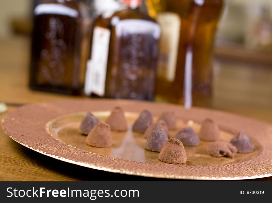 Pralines served on gold plate