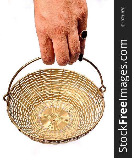 Female hand holding basket isolated on white background.