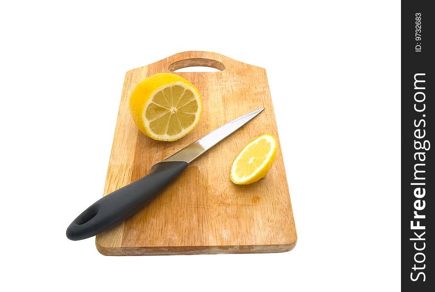 Lemon and knife isolated on white background