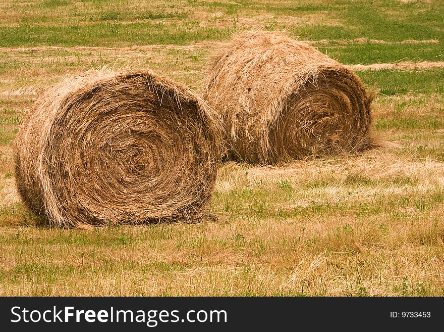 Photo of two hay bales in the italian country