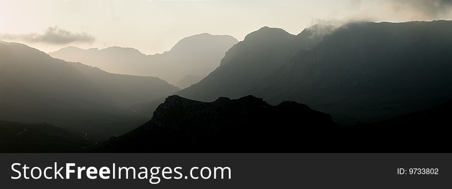 Silhouette of misty mountain range. Silhouette of misty mountain range