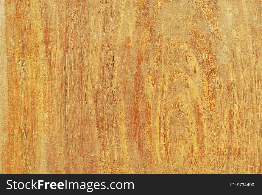 The brown and yellow wood board texture background. The brown and yellow wood board texture background.