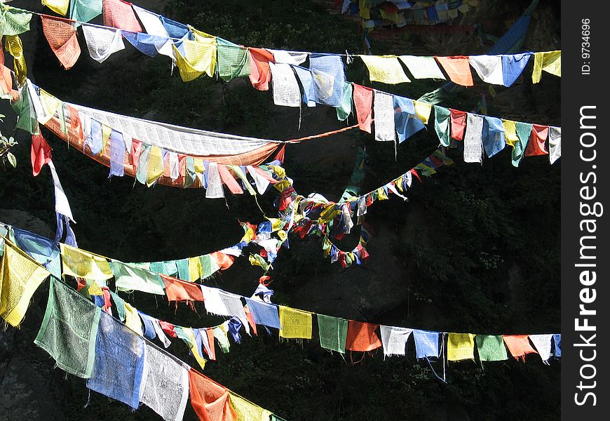 Prayer flags against a black background. Prayer flags against a black background