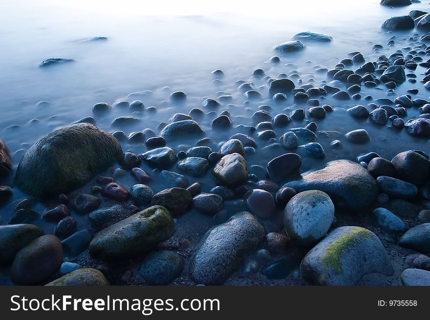 Baltic Seaside With Stones After Sunset