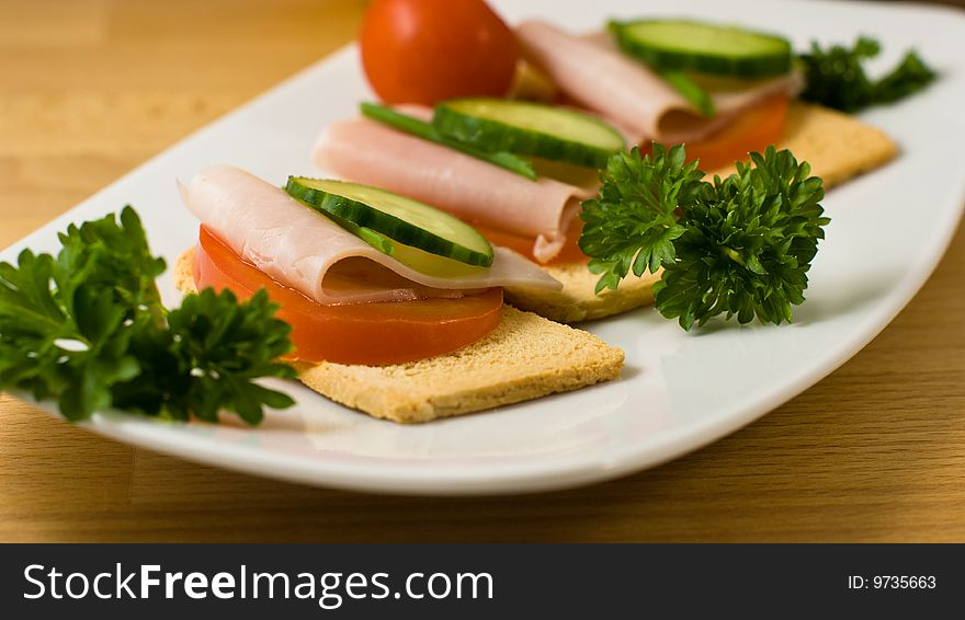 Snack with ham,olives and vegetables. Snack with ham,olives and vegetables