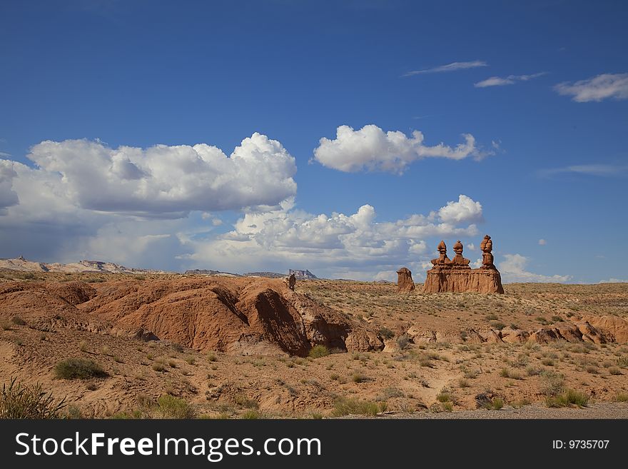 View of red rock formations in San Rafael Swell with blue sky�s the and clouds