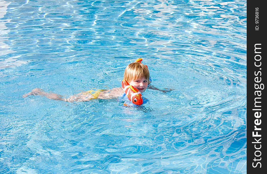 Little girl in the swimming pool. Little girl in the swimming pool