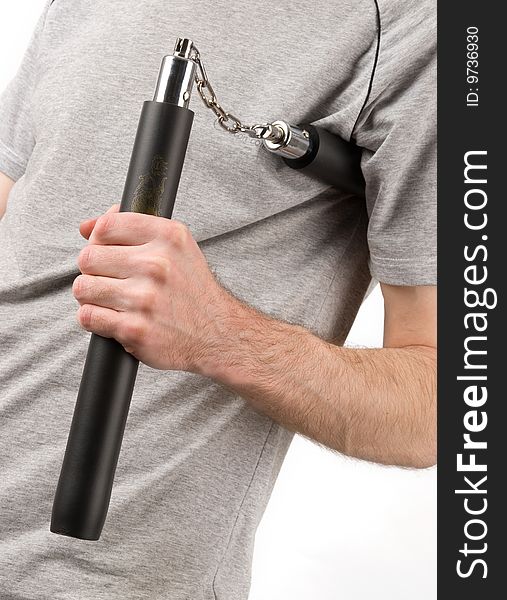 Man holding Training Nunchaku. Closeup