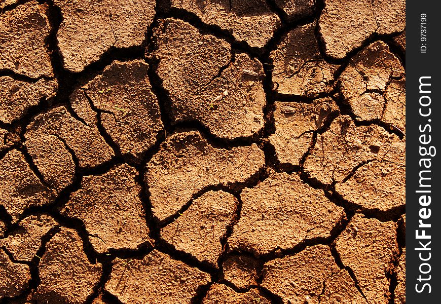 Cracks in a ground аbstract background