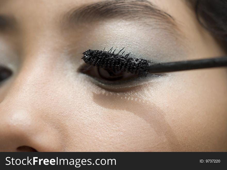 A young woman getting her eye lashes made up. ADOBE RGB (1998) color profile, image is punchier than the preview. A young woman getting her eye lashes made up. ADOBE RGB (1998) color profile, image is punchier than the preview.