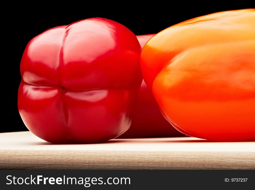 Vegetables - Peppers on cutting board. Vegetables - Peppers on cutting board