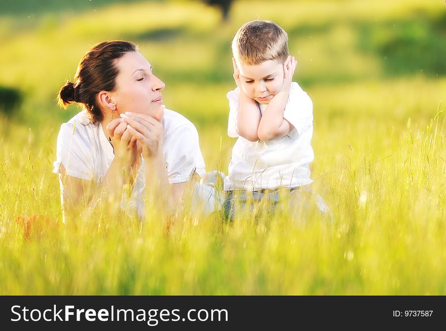 Happy young woman mother play and outdoor with beautiful child. Happy young woman mother play and outdoor with beautiful child
