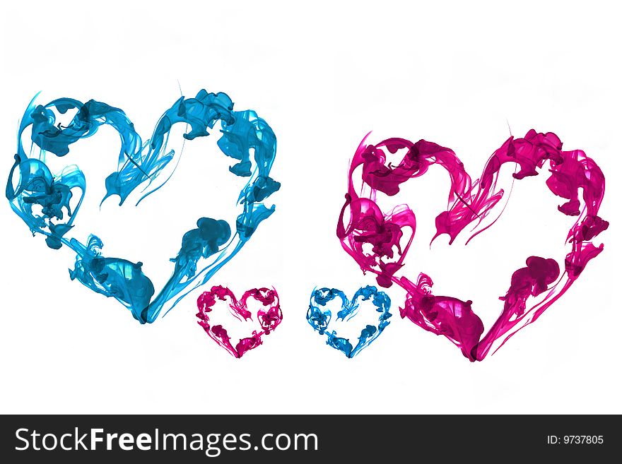 Blue and pink heart ink underwater isolated. Blue and pink heart ink underwater isolated