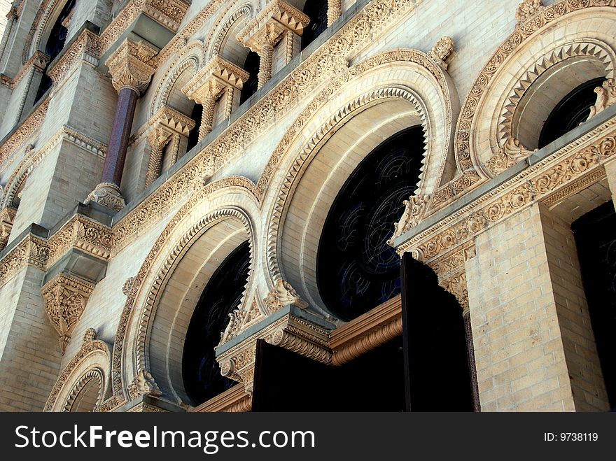 The glorious Moorish and neo-romanesque west front with its intricate carved windows and columns at the historic 1887 Eldridge Street Synagogue in Chinatown - Lee Snider Photo. The glorious Moorish and neo-romanesque west front with its intricate carved windows and columns at the historic 1887 Eldridge Street Synagogue in Chinatown - Lee Snider Photo.